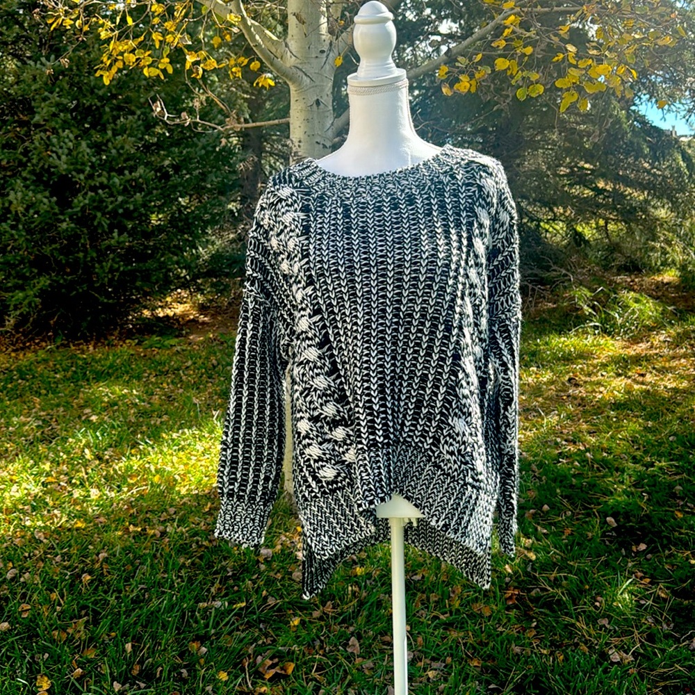 Adorable Chloe Kay size medium, loose neck, cable sweater, black-and-white.